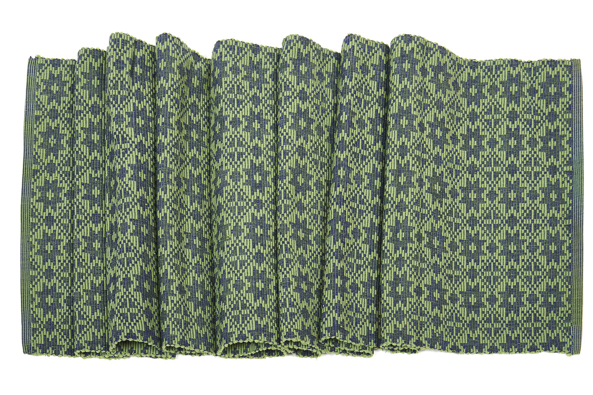 Chemin de table en coton bio. Modèle vert côtelé aux motifs étoilés